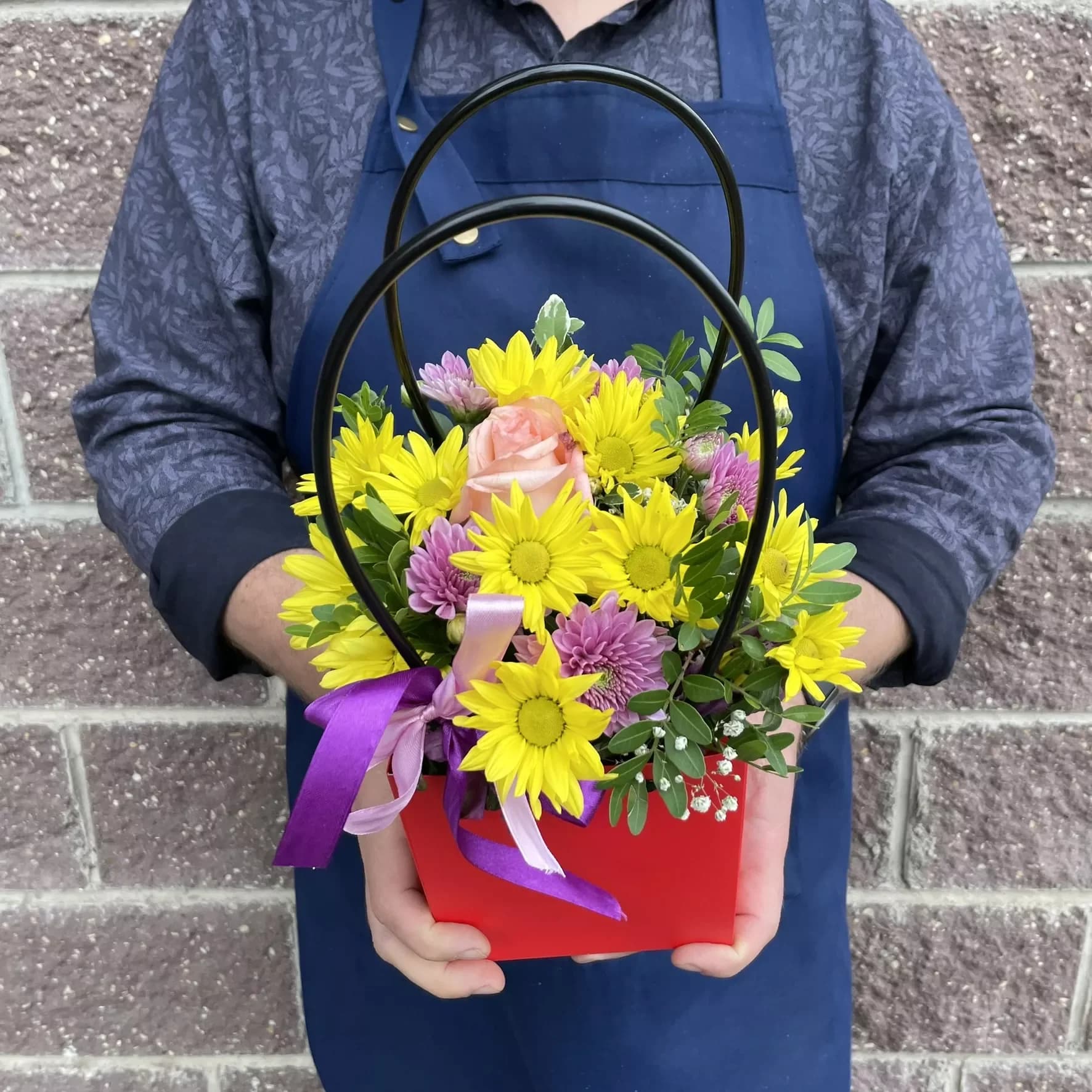 Les fleurs dans le sac à main