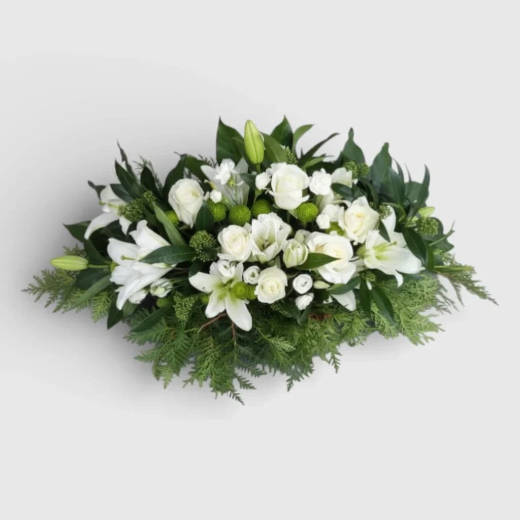 Composition florale de lys, roses, et lisianthus