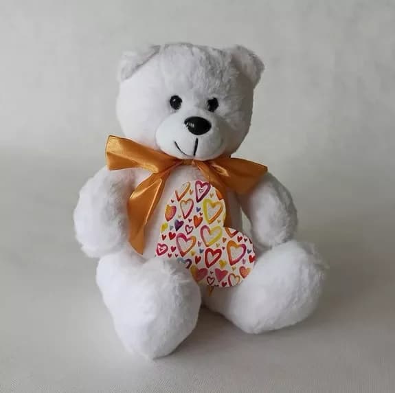 Ours en peluche et bouquet de fleurs