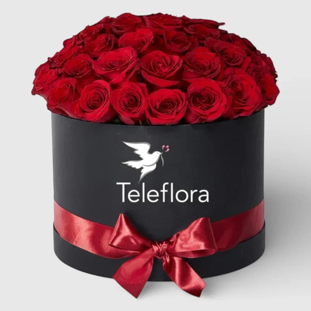 Des roses rouges dans une boîte noire